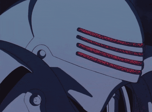 a close up of a helmet with red stripes on the side