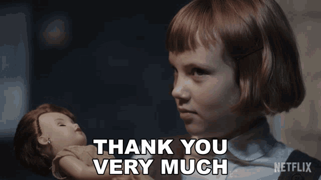 a little girl holding a doll with the words thank you very much written below her