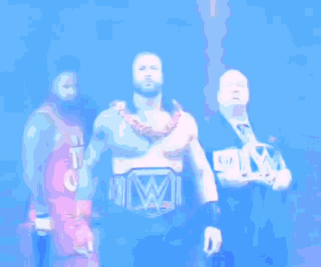 roman reigns is the wwe world heavyweight champion and is walking down the stage