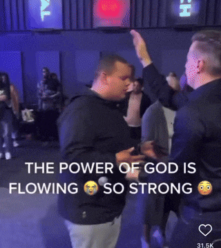 a man giving another man a high five with the words " the power of god is flowing so strong "