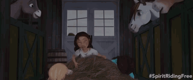 a group of girls are standing in a stable with their arms in the air and the hashtag #spiritridingfree