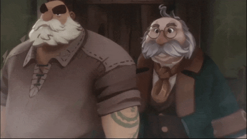 a man with a tattoo on his arm stands next to another man with a beard