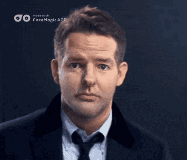 a man in a suit and tie is made with facemagic