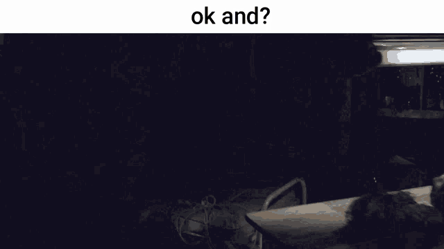 an empty bed in a dark room with the words " ok and " below it