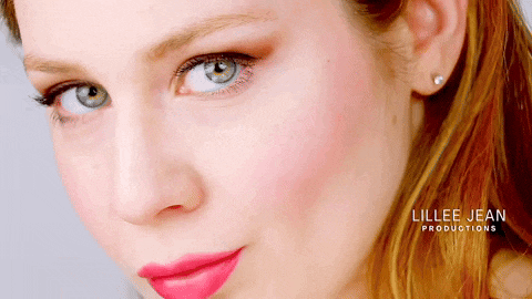 a close up of a woman 's face with the name lillee jean on the bottom right