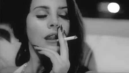 Lana Del Rey Smokes GIF - Lana Del Rey Smokes Cigarette GIFs