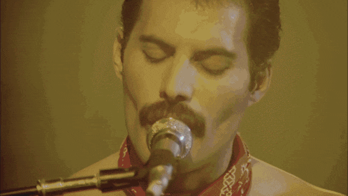 Freddie Mercury Queen GIF - Freddie Mercury Queen We Are The Champions GIFs