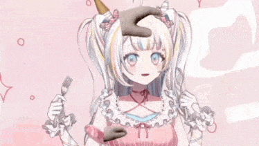 a girl in a pink dress is holding a fork and spoon