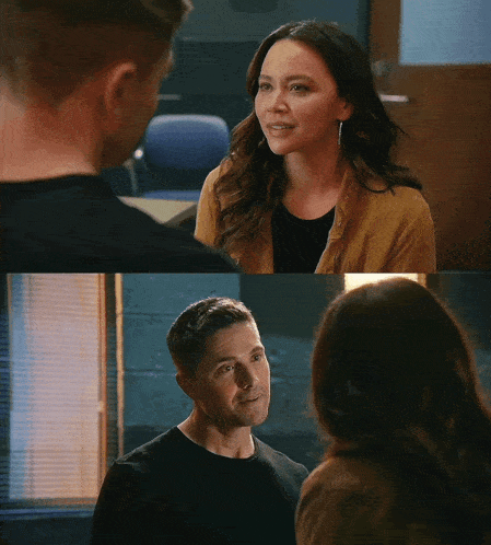 a man and a woman are standing next to each other