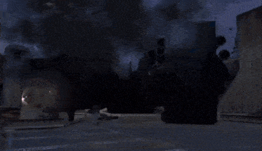 a video game scene with a huge explosion coming out of a building