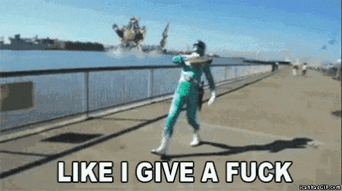 a green power ranger is walking down a sidewalk with the words like i give a fuck above him