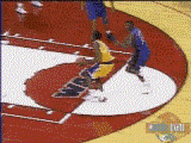 a basketball game is being played on a court that says nba on it