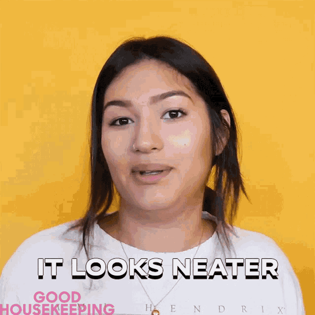 a woman says " it looks neater " while wearing a white shirt