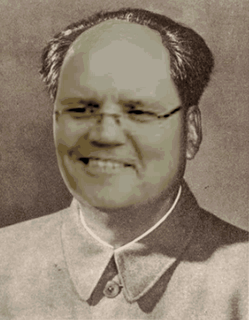 a man with glasses and a bald head is smiling in a black and white photo