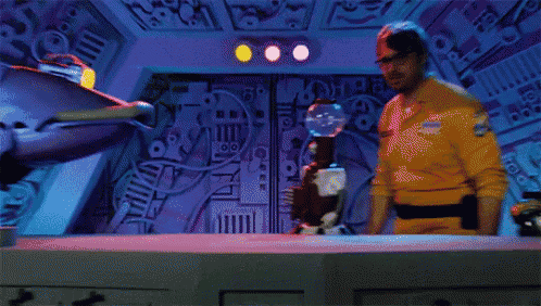 a pixelated image of a man in a yellow uniform with a badge that says ' i 'm a robot '