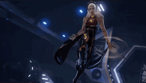 a woman in a futuristic outfit is standing in a room with a lot of lights behind her