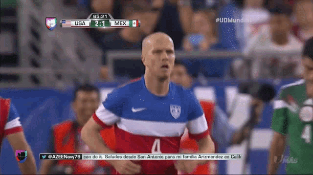 a soccer game is being played between the usa and the mexico