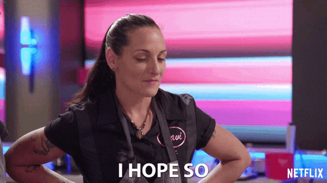 a woman wearing a netflix shirt says i hope so