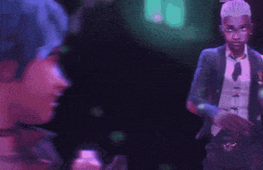 a man and a woman are dancing together in a club .