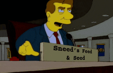 a cartoon character is giving a speech behind a sign that says sneed 's feed & seed