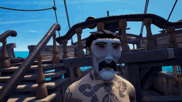 a man with a tattoo on his chest is standing on a ship