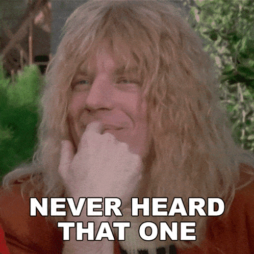 a man with long blonde hair is smiling with the words " never heard that one " below him