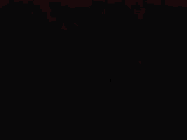 a red glowing symbol on a dark background