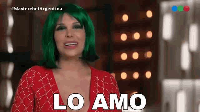 a woman with green hair says " lo amo " in white letters