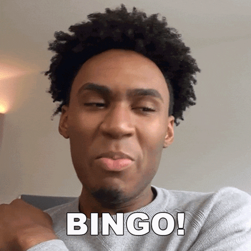 a man with curly hair is making a funny face with the word bingo above his head