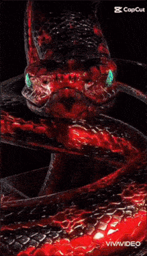a close up of a snake 's mouth with its tongue hanging out .