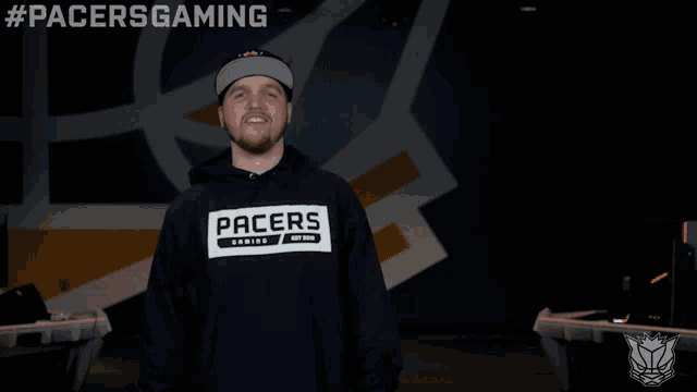 a man wearing a pacers gaming hoodie