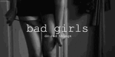 a black and white photo of a woman taking off her underwear with the words `` bad girls do bad things '' written above her .