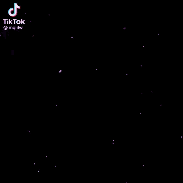 a blurry picture of a person standing in the water with a tiktok watermark