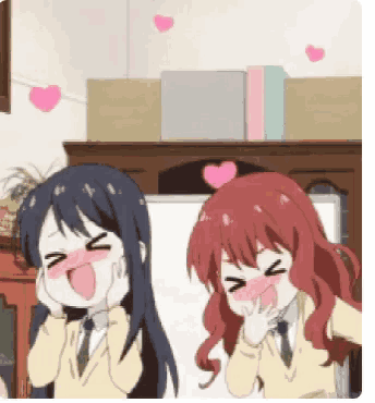 a couple of anime girls are standing next to each other with hearts on the wall behind them .