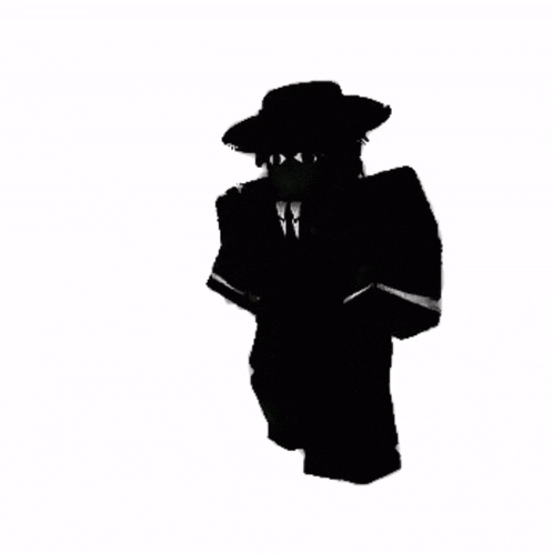 a silhouette of a person wearing a suit and tie is walking .