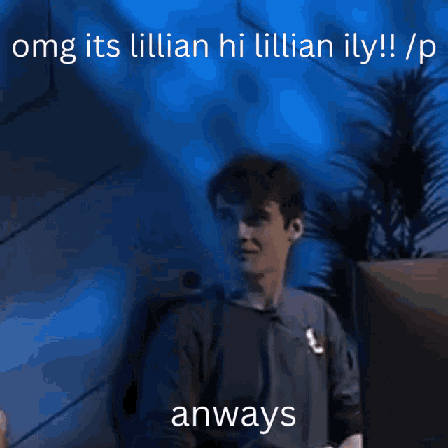 a man sitting in front of a computer with the words omg its lillian hi lillian ily / p anyways
