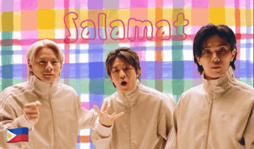 three men standing in front of a colorful plaid background with the word salamat written on it
