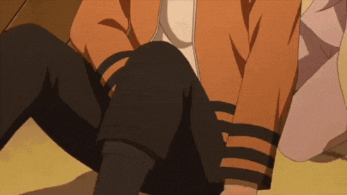 a close up of a person 's legs with a striped shirt on