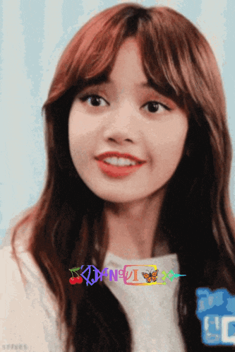 a close up of a woman 's face with a butterfly and a cherry in the background