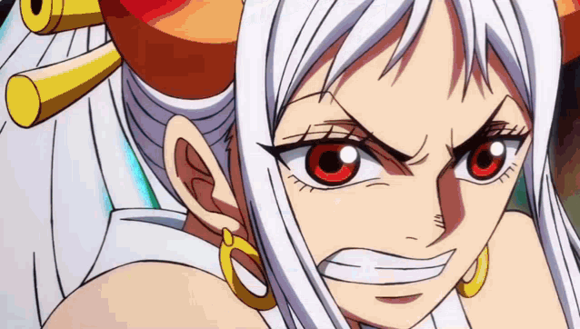 a close up of a cartoon character 's face with a very angry look on her face .