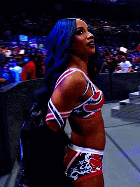 a woman with blue hair and a red white and blue outfit