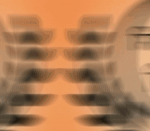a blurred image with the letter w on the bottom