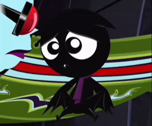 a black cartoon character with a red hat is sitting on a green and red striped surface .