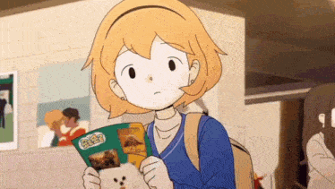 a cartoon girl is holding a magazine with pictures of animals on it .