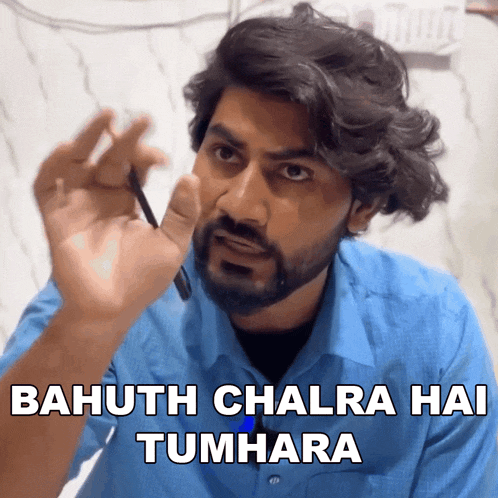 a man with a beard holds a pen in his hand and says bahuth chlra hai tumhara