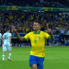 a man in a yellow jersey with the number 9 on it