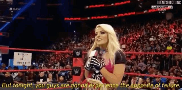 a woman in a wrestling ring with the words but tonight you guys are gonna experience the opposite of failure written below her