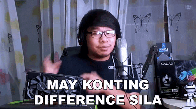 a man sitting in front of a microphone with the words may konting difference sila