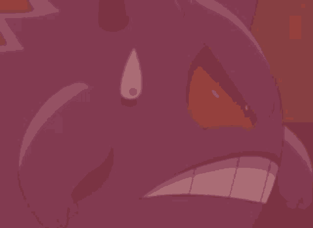 a close up of a purple cartoon character with red eyes and a tear coming out of its eye .