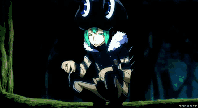 a girl with green hair is wearing a black cat hat and kneeling down